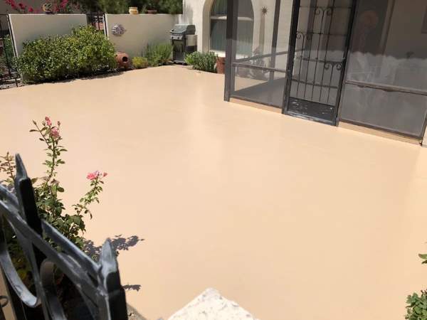 Freshly sealed cool deck patio surface in sand color at Tucson residence