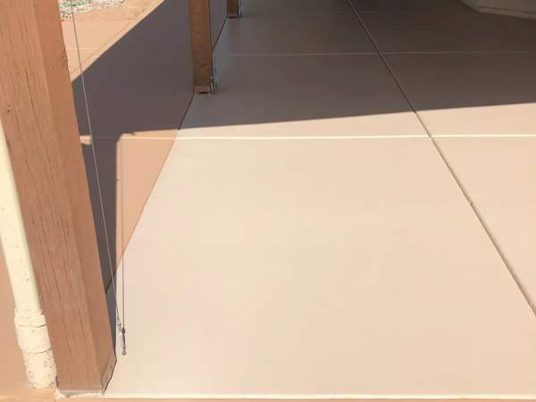 Dual-tone cool deck walkway with clean expansion joints in Southern Arizona